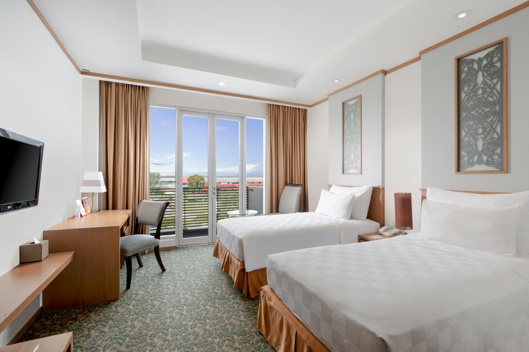Swiss-Belhotel Danum Palangkaraya Værelse billede